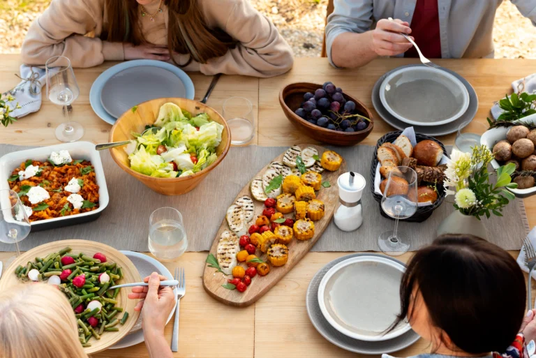 close up people table with food
